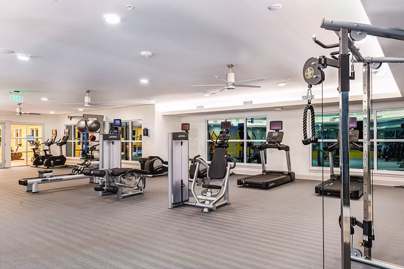 Modern fitness center with state-of-the-art equipment at Renaissance Santa Rosa Apartments