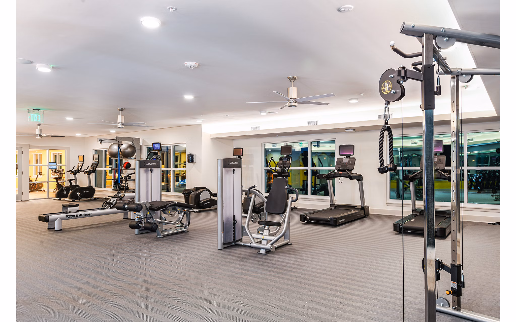 Modern fitness center with state-of-the-art equipment at Renaissance Santa Rosa Apartments
