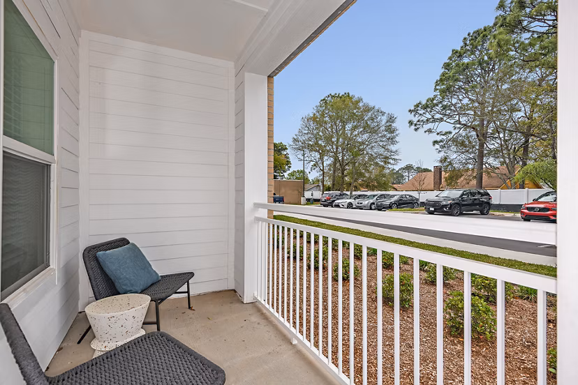 Renaissance Santa Rosa Apartments: Modern patio featuring comfortable seating and lush greenery