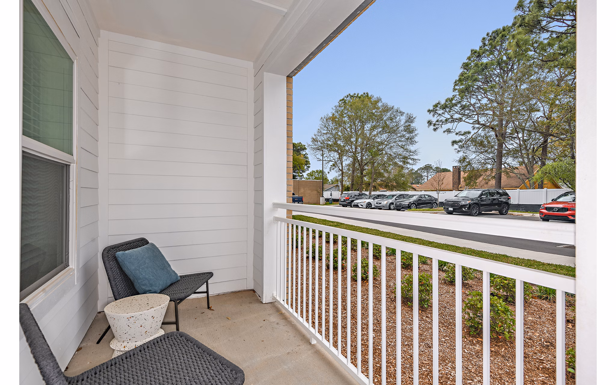 Renaissance Santa Rosa Apartments: Modern patio featuring comfortable seating and lush greenery