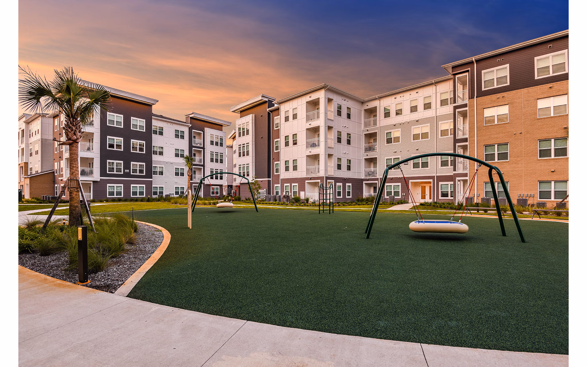 Playground with modern equipment at Renaissance Santa Rosa Apartments for family-friendly fun