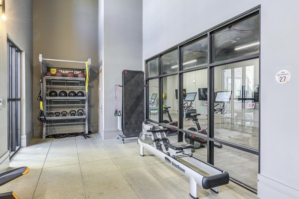 State-of-the-art fitness center with modern equipment at Monaco Midland Apartments luxury living