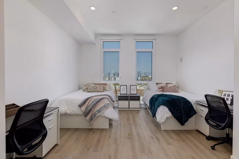 Modern bedroom with city view at The 505 Apartments