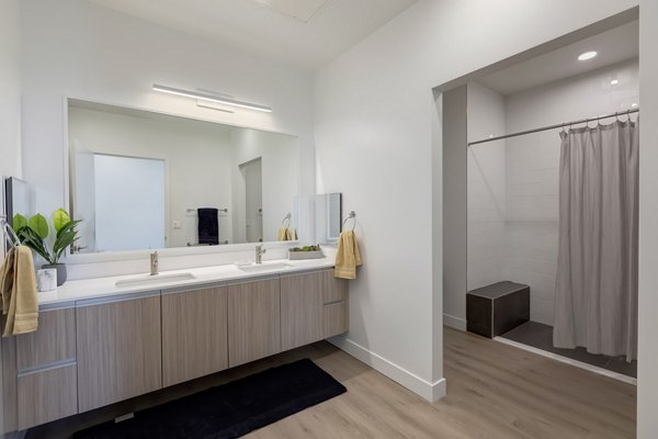 Modern bathroom with sleek fixtures at The 505 Apartments in a luxury Greystar community