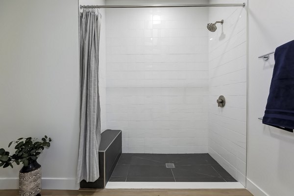 Luxurious bathroom with modern fixtures at The 505 Apartments, a Greystar community