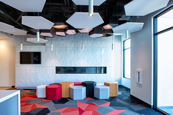 Clubhouse with modern design and seating areas at The 505 Apartments, luxury living offered by Greystar