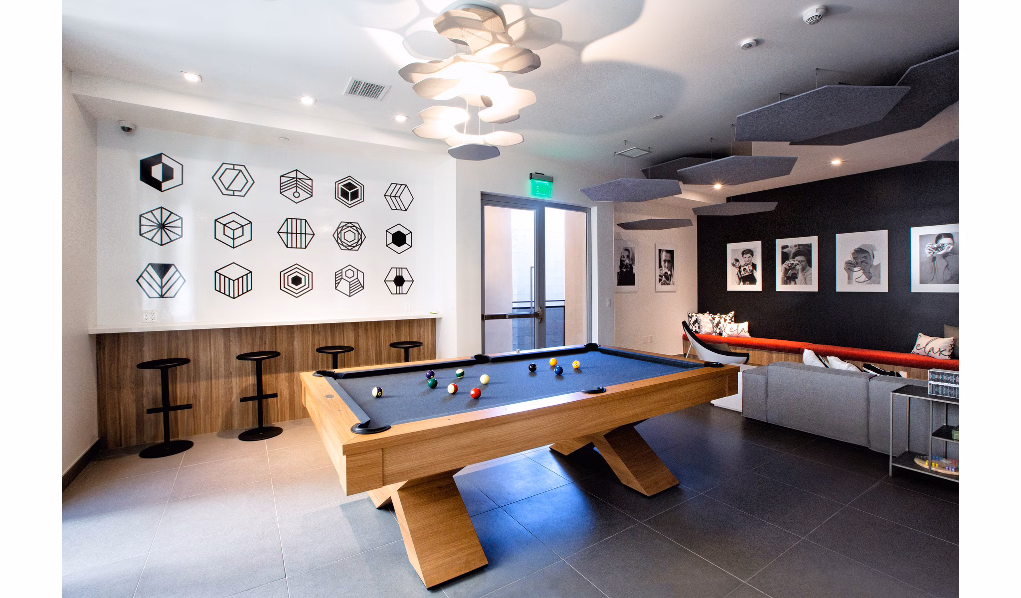 Clubhouse featuring modern decor and seating at The 505 Apartments, luxury living facilitated by Greystar