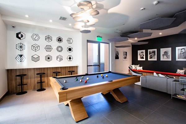 Clubhouse featuring modern decor and seating at The 505 Apartments, luxury living facilitated by Greystar