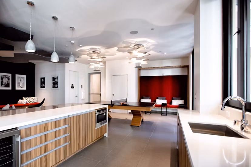 Modern clubhouse with elegant seating and large windows at The 505 Apartments, Nashville