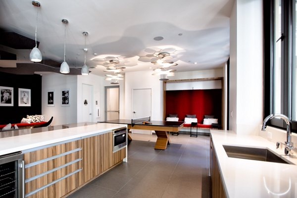 Modern clubhouse with elegant seating and large windows at The 505 Apartments, Nashville