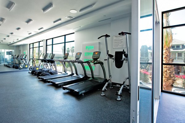 Modern fitness center with state-of-the-art equipment at The 505 Apartments