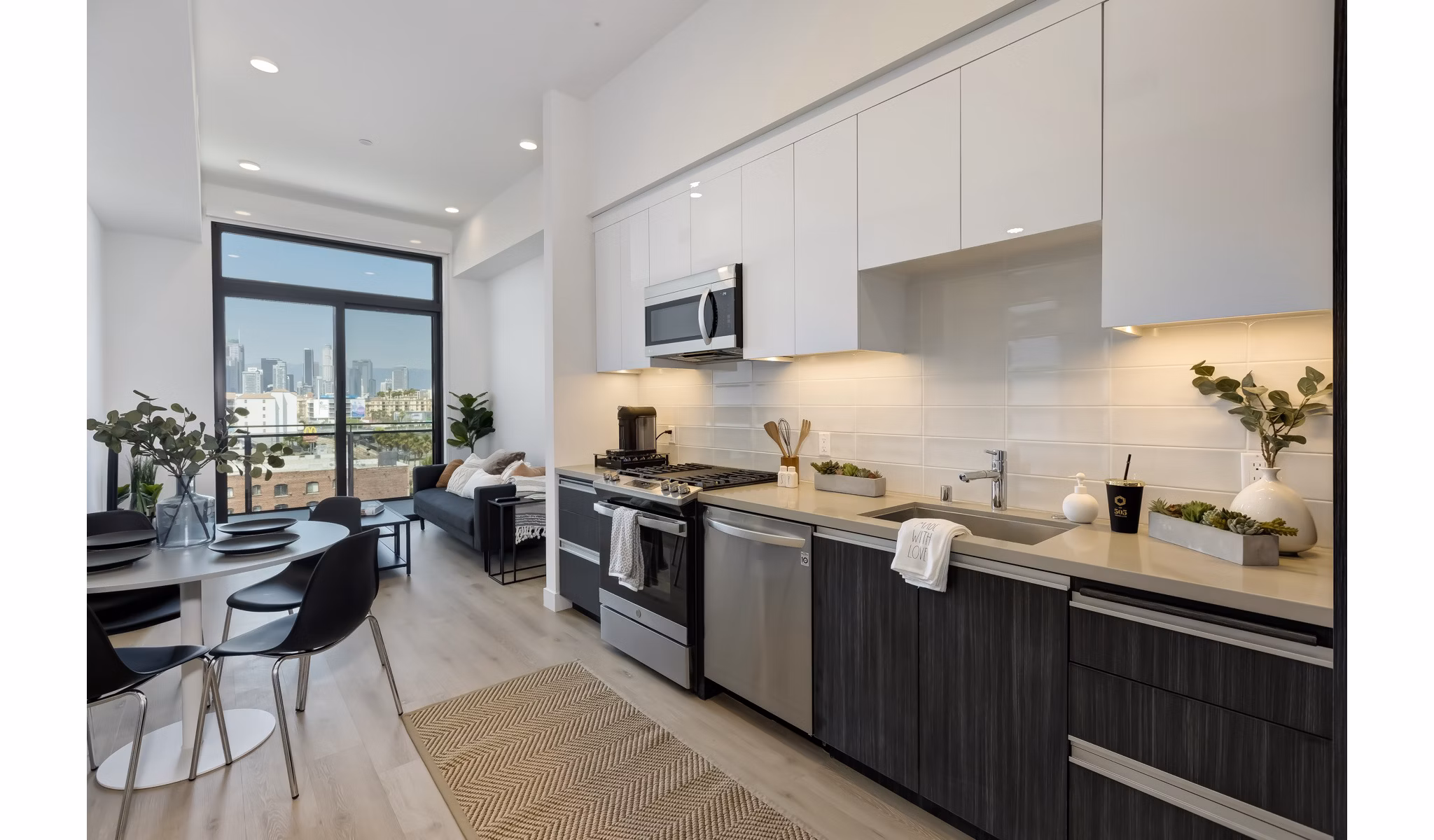 Modern kitchen with stainless steel appliances at The 505 Apartments, luxury living spaces designed for style and functionality