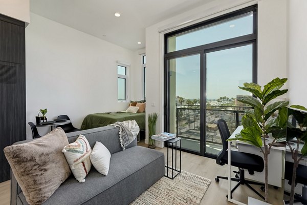 Contemporary living room with stylish interior design at The 505 Apartments in luxury Greystar community