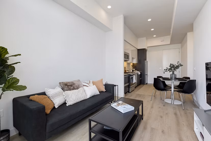 Modern living room with stylish decor in The 505 Apartments, showcasing elegance and comfort in urban living