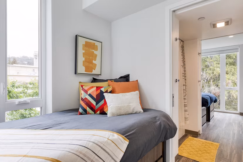 Luxurious bedroom with elegant decor at The Durant Apartments featuring premium finishes