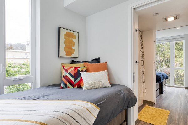 Luxurious bedroom with elegant decor at The Durant Apartments featuring premium finishes