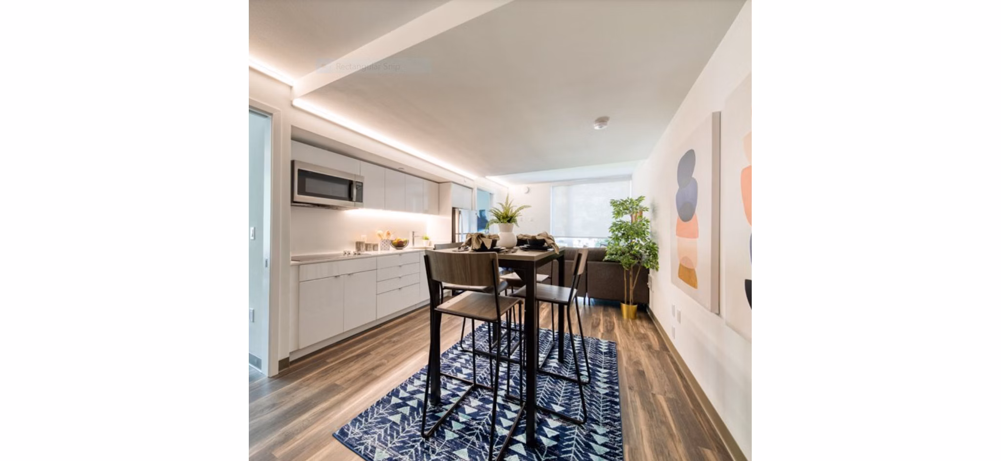 Dining area featuring modern decor and elegant lighting at The Durant Apartments in a luxury setting