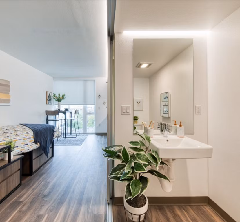 Elegant hallway with modern lighting at The Durant Apartments, a Greystar luxury property