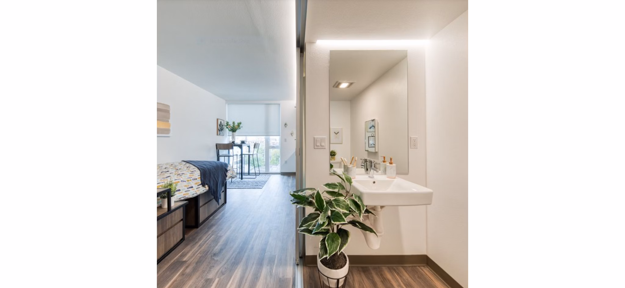 Elegant hallway with modern lighting at The Durant Apartments, a Greystar luxury property