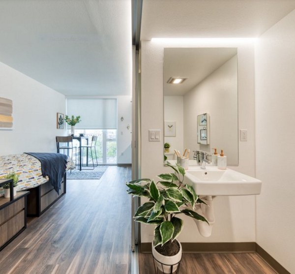 Elegant hallway with modern lighting at The Durant Apartments, a Greystar luxury property