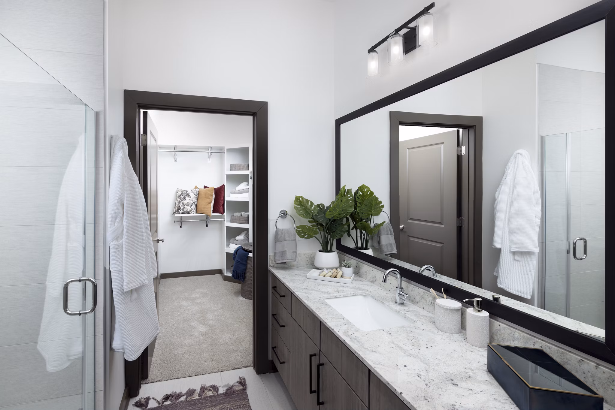Luxurious bathroom with modern fixtures at Everleigh Duluth Apartments