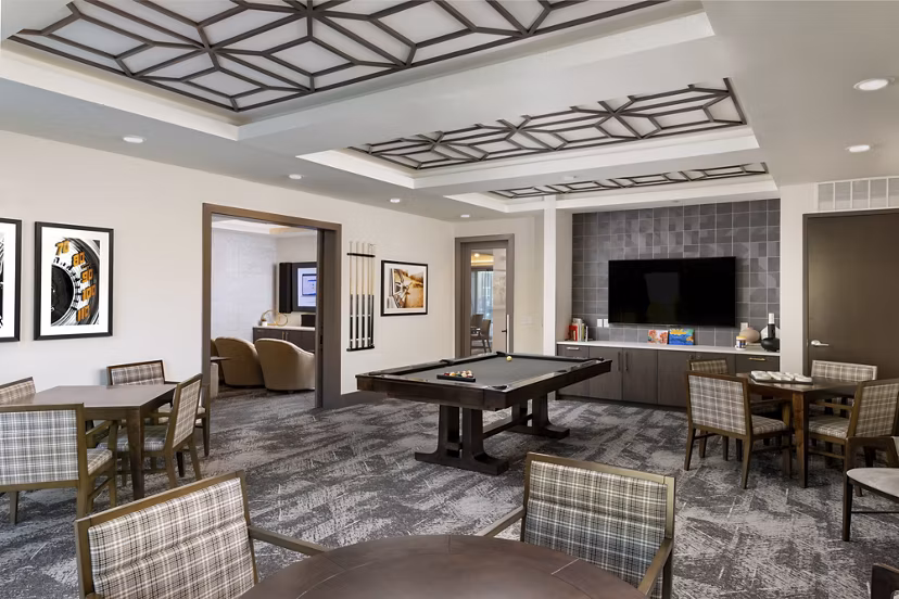 Game room featuring modern arcade games at Everleigh Duluth Apartments