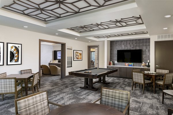 Game room featuring modern arcade games at Everleigh Duluth Apartments