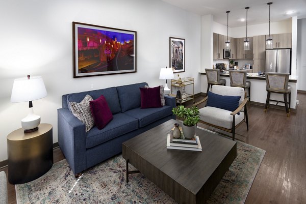 Spacious living room with modern furnishings at Everleigh Duluth Apartments