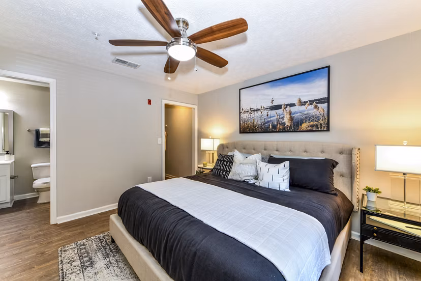 Cozy bedroom featuring modern decor and ample natural light in Avana Acworth Apartments