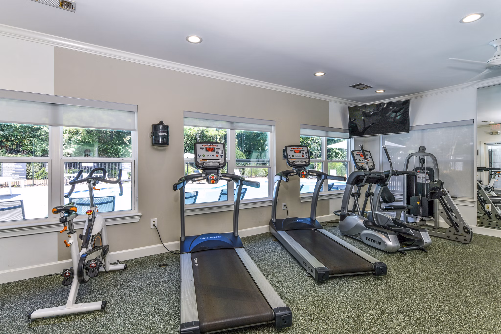 Modern fitness center with state-of-the-art equipment at Avana Acworth Apartments