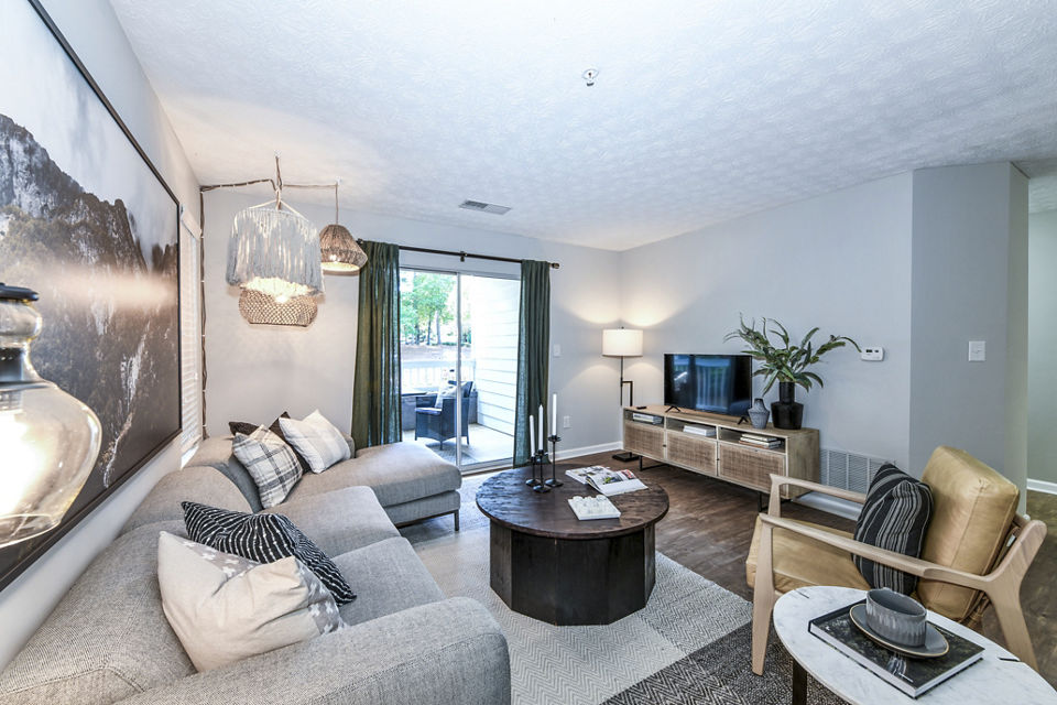 Spacious living room with modern furnishings at Avana Acworth Apartments