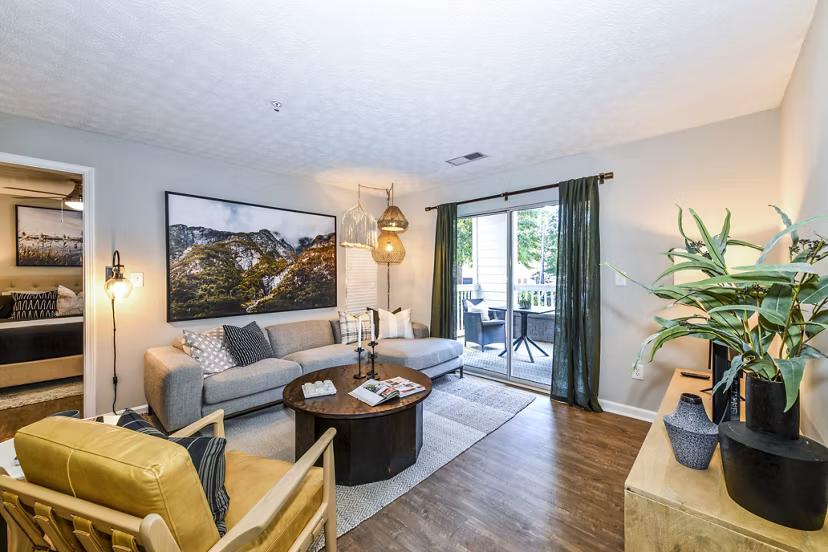 Modern living room featuring contemporary decor and ample seating in Avana Acworth Apartments