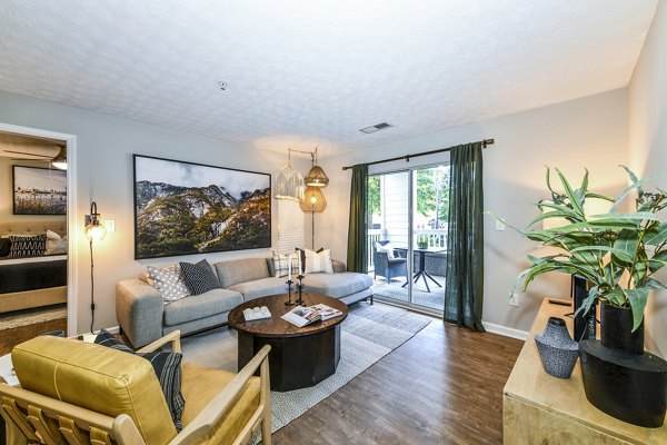 Modern living room featuring contemporary decor and ample seating in Avana Acworth Apartments