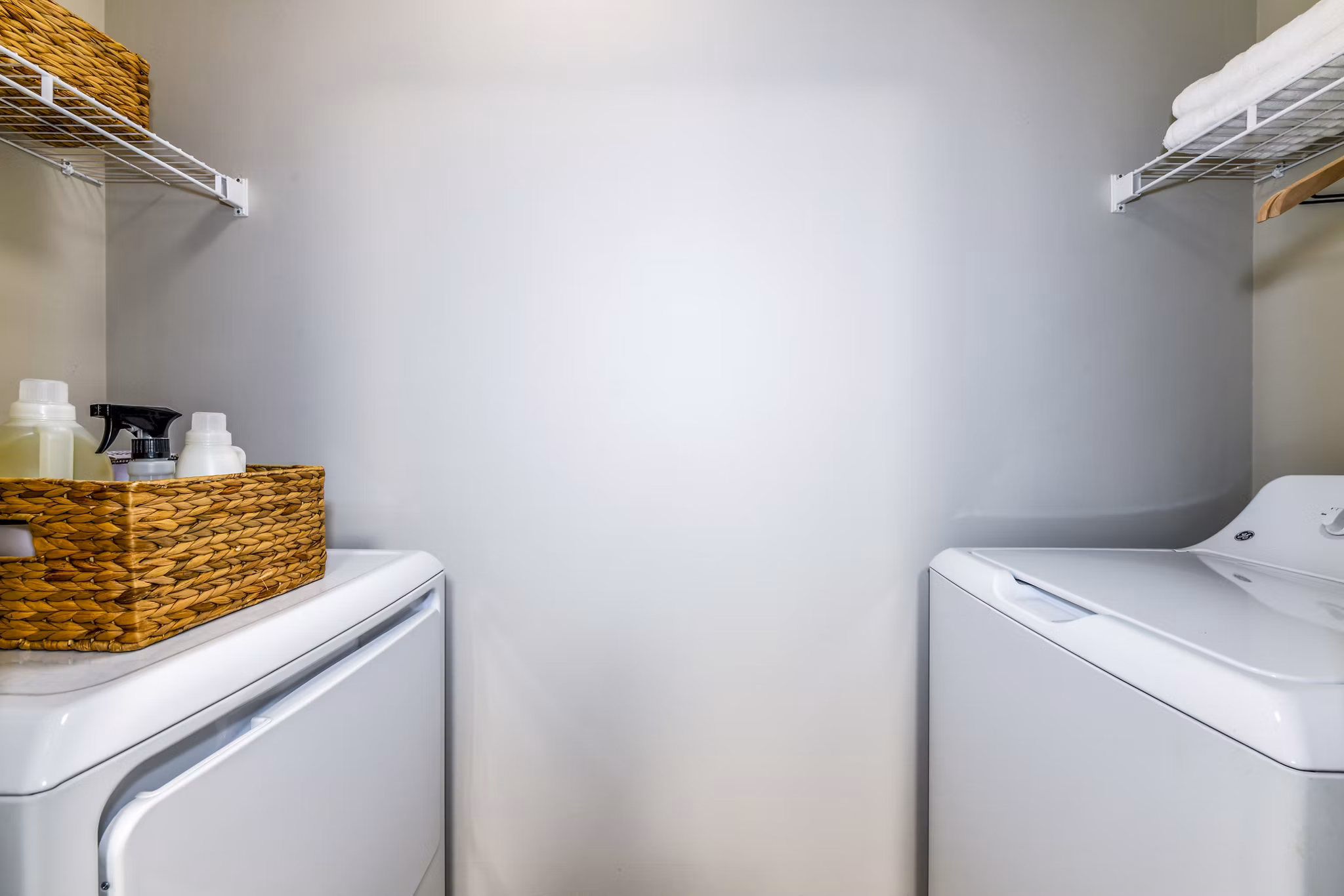 Laundry room at Avana Acworth Apartments featuring modern washers and dryers for convenient living