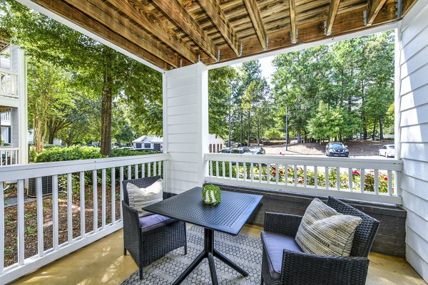 Relaxing patio balcony with modern furnishings at Avana Acworth Apartments, perfect for enjoying outdoor views