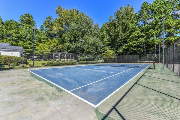Well-maintained tennis court at Avana Acworth Apartments offering recreational space for residents