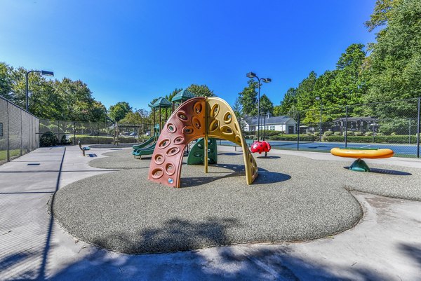 Playground area with colorful equipment at Avana Acworth Apartments for outdoor fun and recreation
