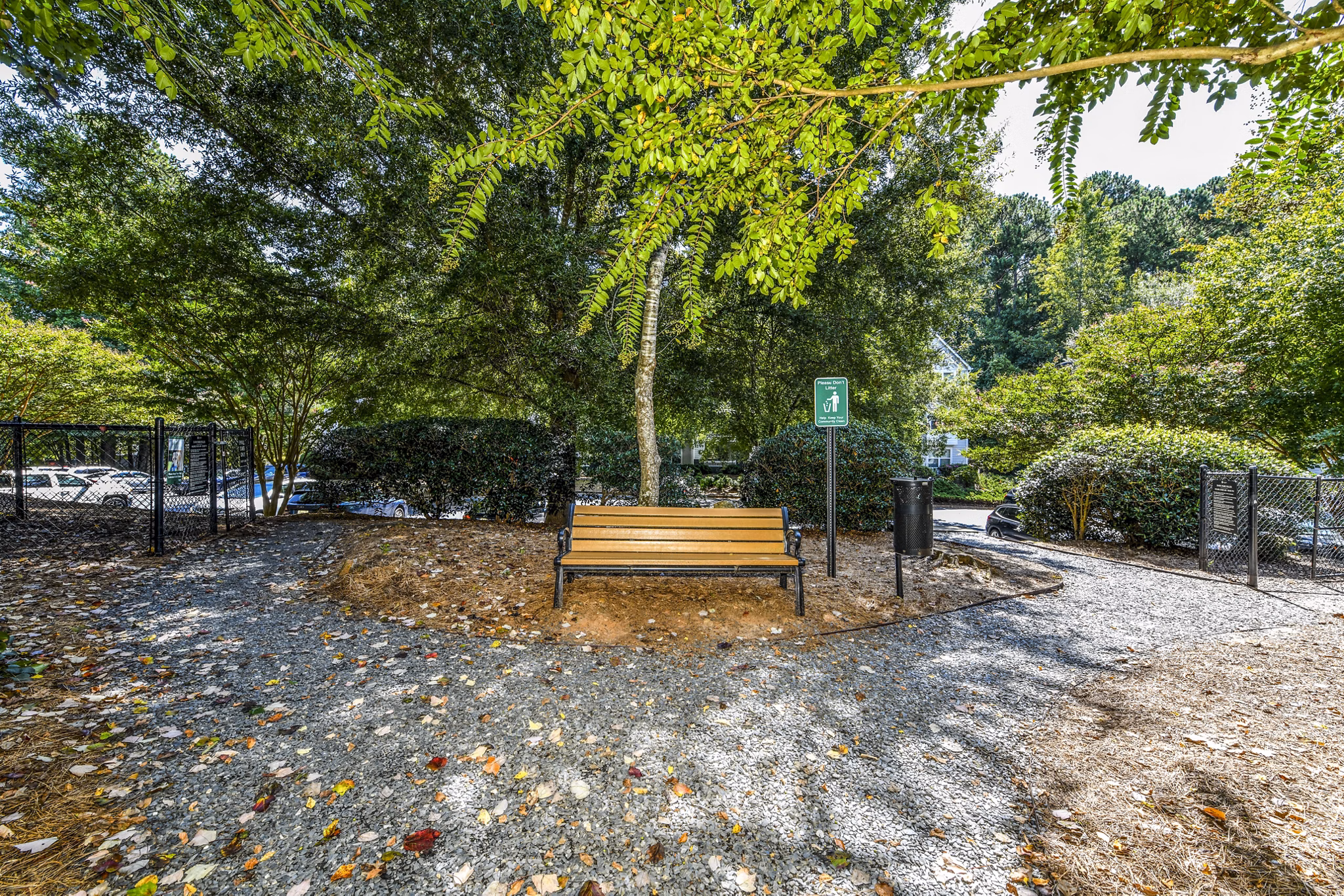 Expansive dog park at Avana Acworth Apartments, featuring agility equipment and open play areas for resident pets