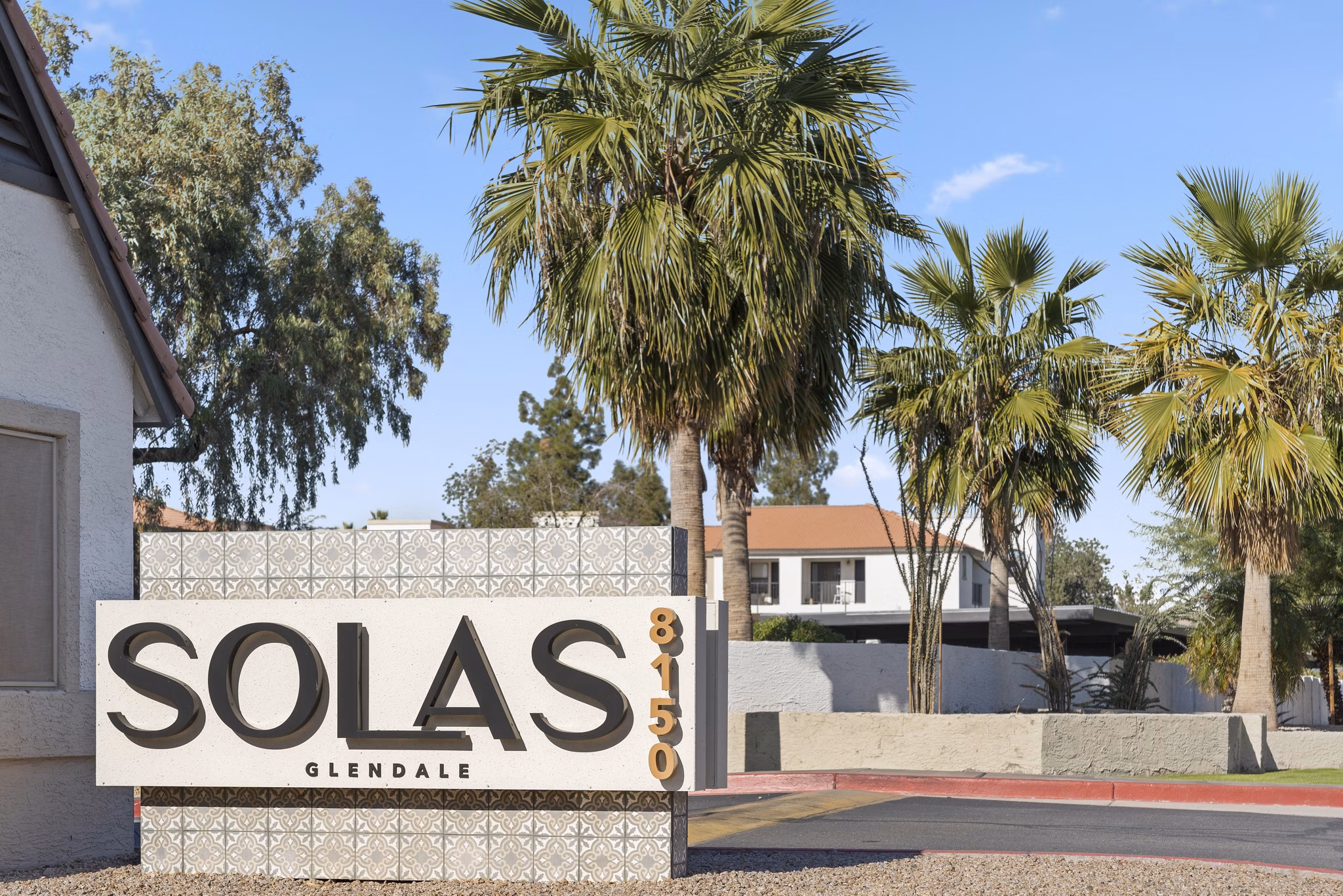 Solas Glendale Apartments sign showing luxury living options in prime location