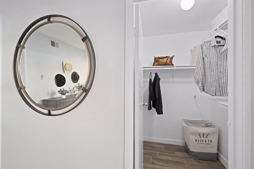 Walk-in closet with ample storage space in Solas Glendale Apartments