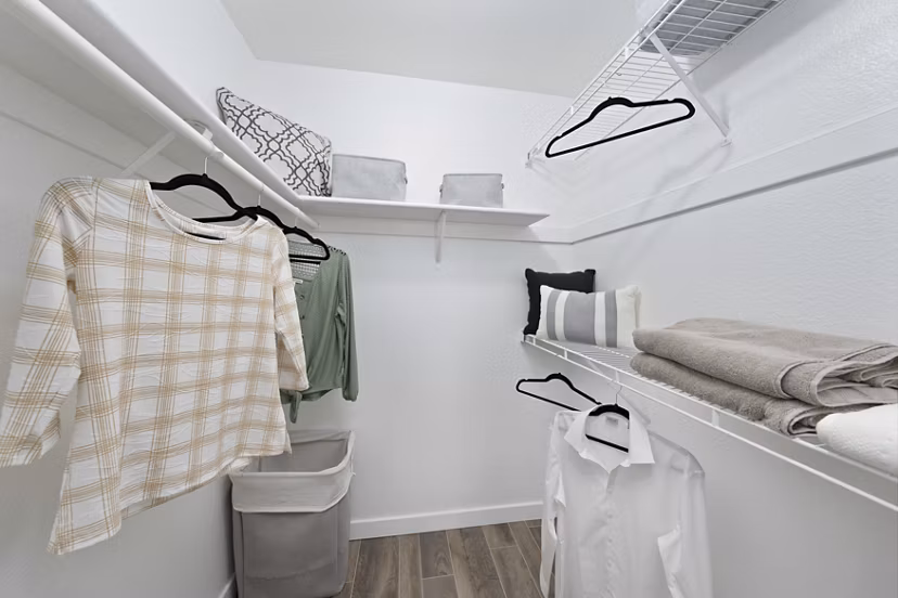 Walk-in closet with ample storage space at Solas Glendale Apartments