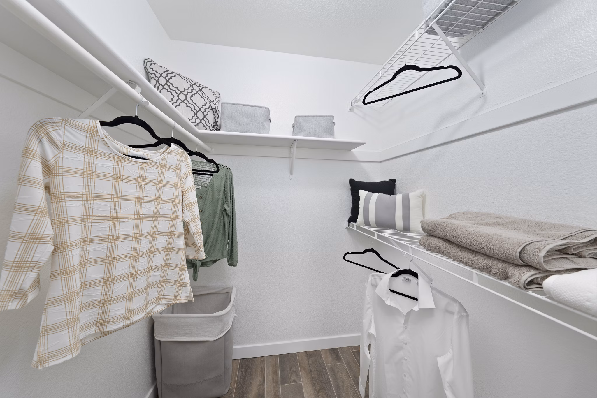 Walk-in closet with ample storage space at Solas Glendale Apartments