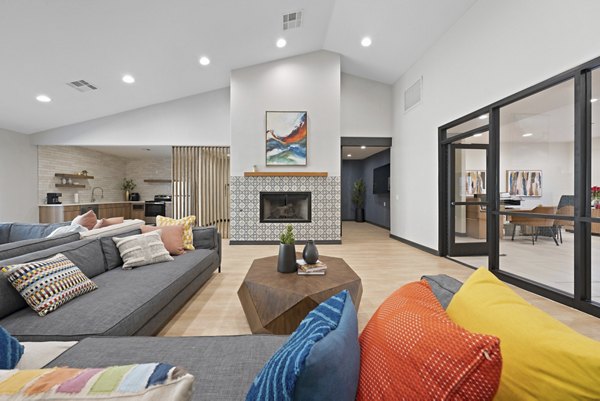 Clubhouse featuring modern design and seating at Solas Glendale Apartments
