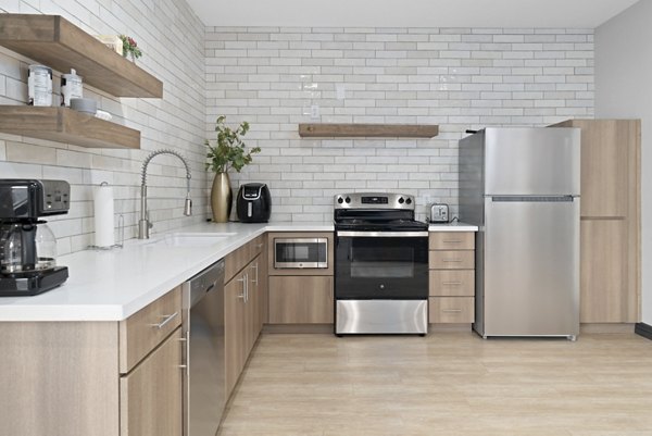 Solas Glendale Apartments: Stylish clubhouse with modern design, luxury seating, and entertainment facilities in Glendale
