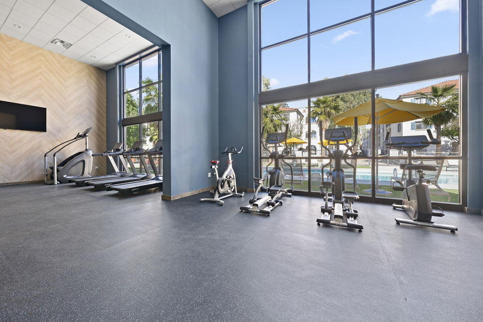State-of-the-art fitness center at Solas Glendale Apartments with modern equipment for luxury living