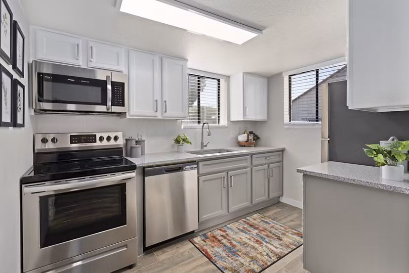 Modern kitchen with stainless steel appliances at Solas Glendale Apartments