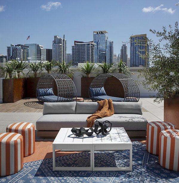 Rooftop deck with modern seating and scenic views at Cielo Apartments, a luxury property by Greystar in the heart of Seattle