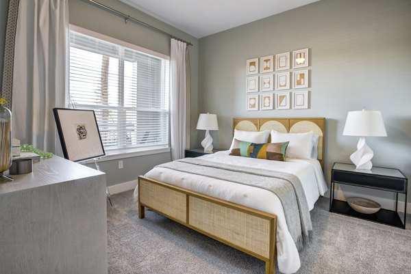 Modern bedroom with elegant decor at Prime Apartments