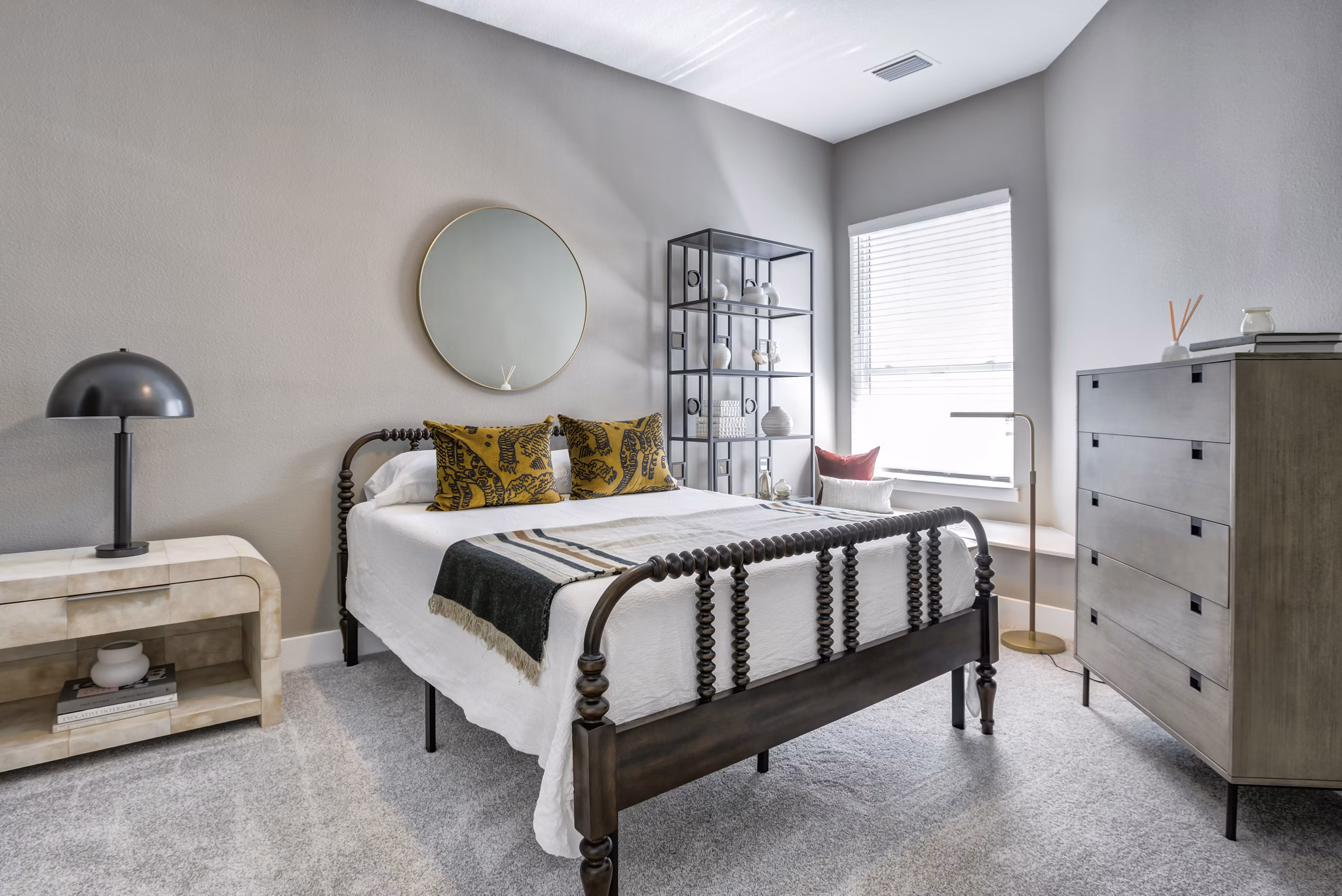 Cozy bedroom with modern decor at Prime Apartments