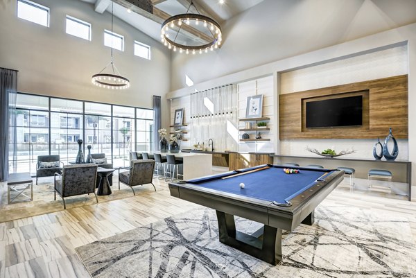 Clubhouse with modern dÃ©cor and seating at Prime Apartments, a luxury community offering upscale amenities for residents